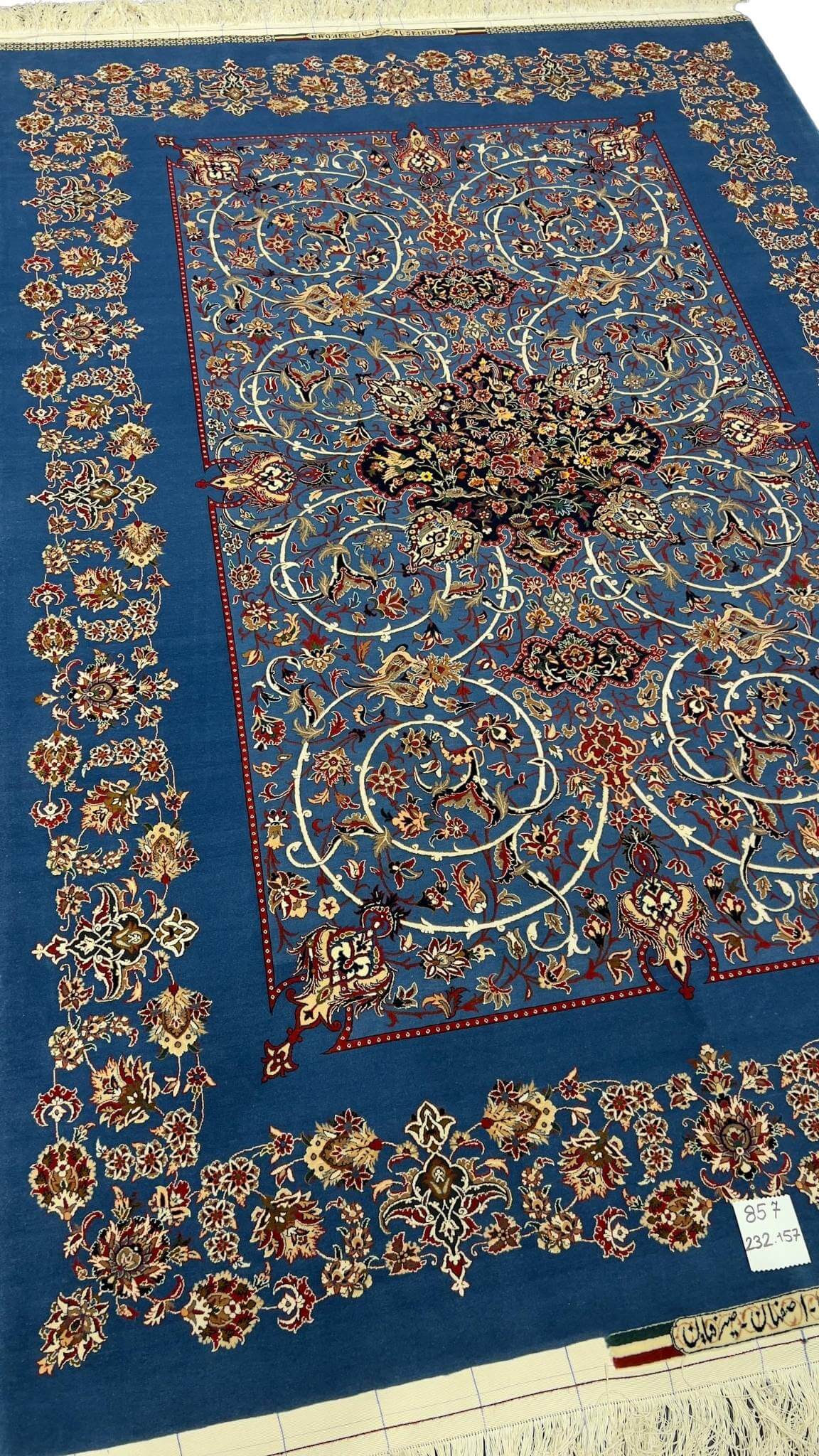 Master Bagher Seirafian's hand-knotted rug in navy blue, ideal for luxurious interiors.